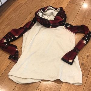 Sweater with plaid accident